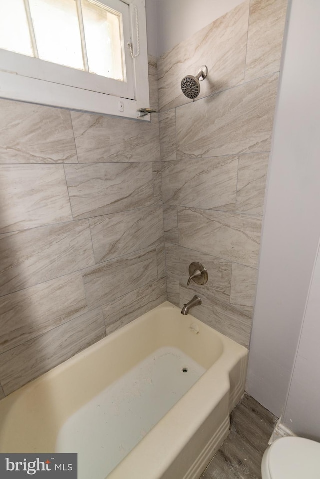 2149 Harford Rd, Baltimore, MD 21218 - bathroom with shower / washtub combination and wood finished floors