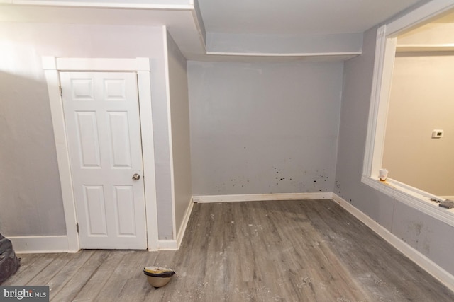 2149 Harford Rd, Baltimore, MD 21218 - spare room featuring wood finished floors and baseboards