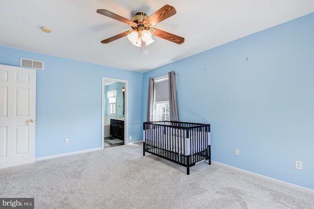 167 Garrisons Lake Blvd, Smyrna, DE 19977 - unfurnished bedroom featuring carpet floors, a nursery area, and ceiling fan