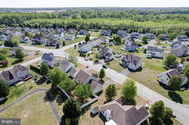 167 Garrisons Lake Blvd, Smyrna, DE 19977 - aerial perspective of suburban area with a heavily wooded area