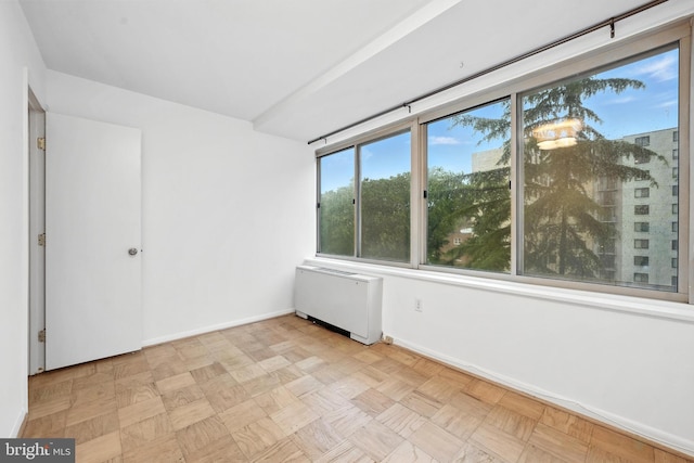 922 24th St NW Unit 504, Washington, DC 20037 - empty room with radiator and baseboards