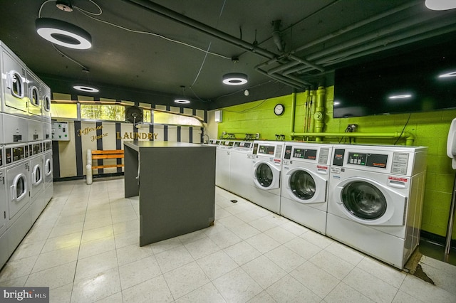 922 24th St NW Unit 504, Washington, DC 20037 - community laundry with stacked washer and clothes dryer and separate washer and dryer