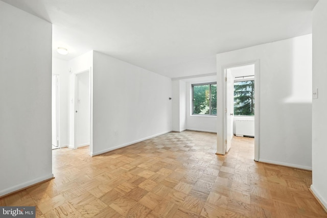 922 24th St NW Unit 504, Washington, DC 20037 - spare room featuring baseboards