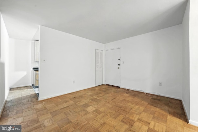 922 24th St NW Unit 504, Washington, DC 20037 - spare room featuring baseboards