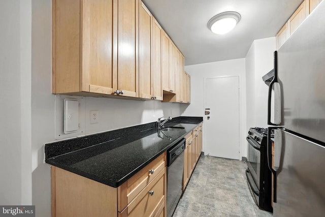 922 24th St NW Unit 504, Washington, DC 20037 - kitchen with stainless steel appliances, dark stone countertops, stone finish floors, and light brown cabinets