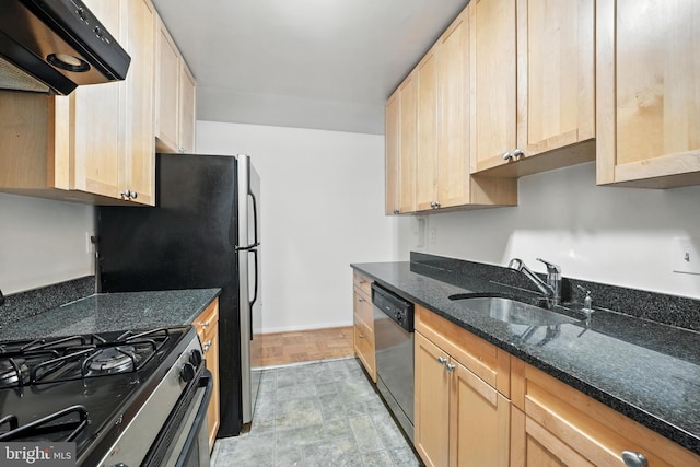 922 24th St NW Unit 504, Washington, DC 20037 - kitchen featuring stainless steel appliances, range hood, light brown cabinetry, and dark stone countertops