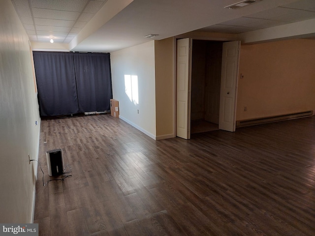 323 Swatara Creek Dr, Jonestown, PA 17038 - spare room with a baseboard radiator, dark wood finished floors, and a paneled ceiling