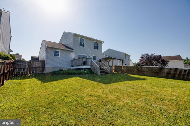 323 Swatara Creek Dr, Jonestown, PA 17038 - back of property with a fenced backyard, a wooden deck, stairway, and a gazebo