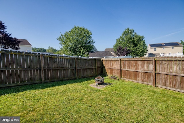 323 Swatara Creek Dr, Jonestown, PA 17038 - fenced backyard with an outdoor fire pit