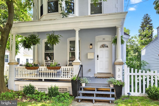 30 Race Ave, Lancaster, PA 17603 - property entrance featuring covered porch and brick siding