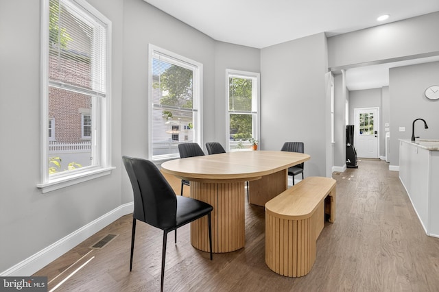 30 Race Ave, Lancaster, PA 17603 - dining room with wood finished floors and healthy amount of natural light