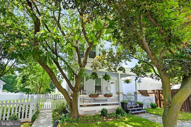 30 Race Ave, Lancaster, PA 17603 - view of front facade with covered porch and a fenced front yard