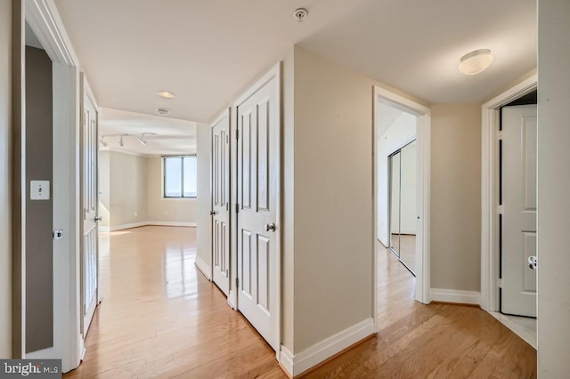 414 Water St Unit 2814, Baltimore, MD 21202 - corridor featuring light wood-type flooring