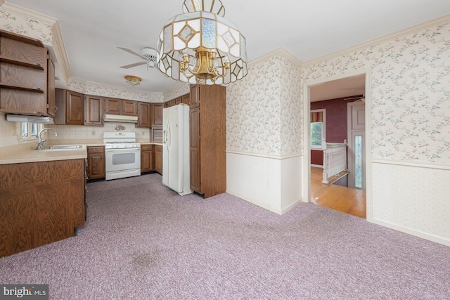 19 Timber Creek Rd, Stratford, NJ 08084 - kitchen featuring white appliances, wallpapered walls, ornamental molding, under cabinet range hood, and wainscoting