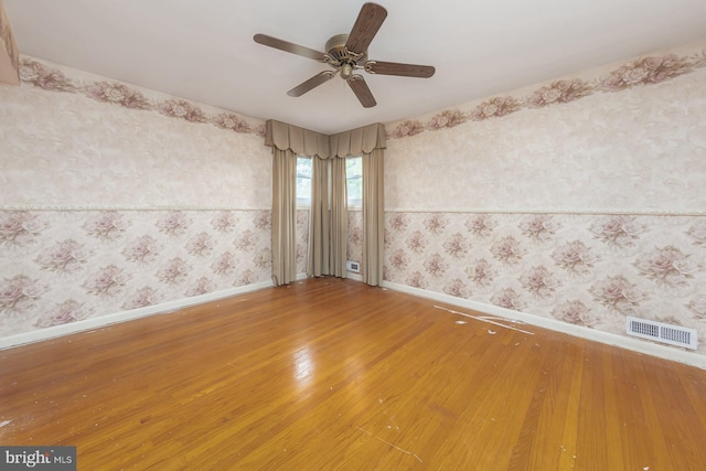 19 Timber Creek Rd, Stratford, NJ 08084 - unfurnished room with light wood-style flooring, a ceiling fan, and wallpapered walls