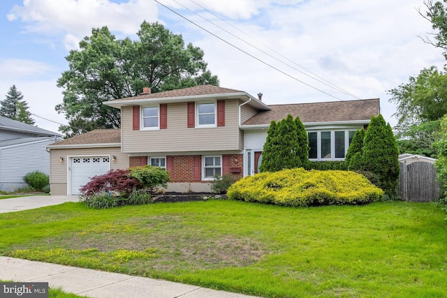 19 Timber Creek Rd, Stratford, NJ 08084 - split level home with an attached garage, concrete driveway, brick siding, and roof with shingles