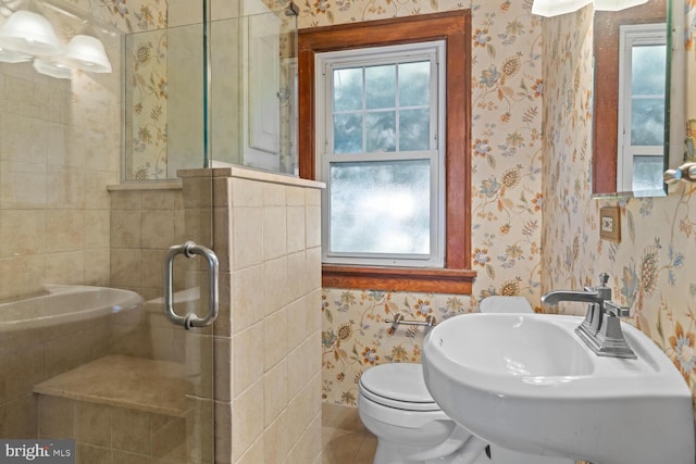 671 Edge Hill Rd, Glenside, PA 19038 - full bath with wallpapered walls, plenty of natural light, an enclosed shower, and tile patterned floors