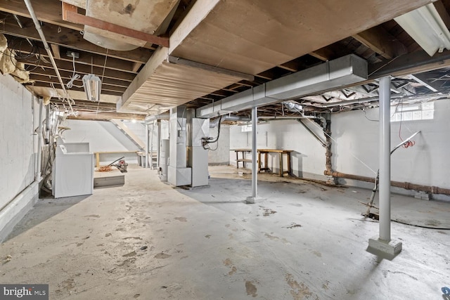 671 Edge Hill Rd, Glenside, PA 19038 - basement featuring washer / dryer and heating unit