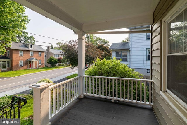 671 Edge Hill Rd, Glenside, PA 19038 - wooden porch featuring a residential view