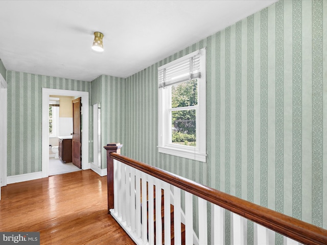 5000 Levindale Rd, Baltimore, MD 21215 - hall with wood finished floors and an upstairs landing