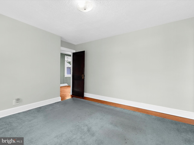 5000 Levindale Rd, Baltimore, MD 21215 - empty room with carpet flooring and a textured ceiling