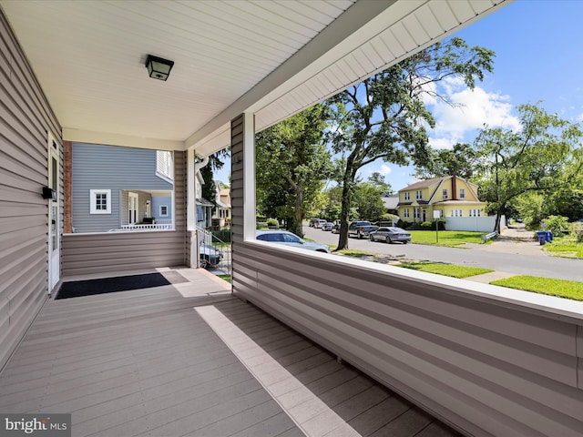5000 Levindale Rd, Baltimore, MD 21215 - wooden porch featuring a residential view