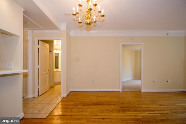 901 N Monroe St Unit 308, Arlington, VA 22201 - unfurnished dining area with ornamental molding, a chandelier, and light wood-style flooring
