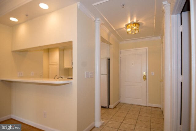 901 N Monroe St Unit 308, Arlington, VA 22201 - entrance foyer with light tile patterned floors and ornamental molding