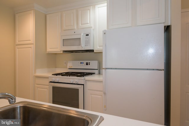 901 N Monroe St Unit 308, Arlington, VA 22201 - kitchen featuring white appliances, white cabinetry, and light countertops