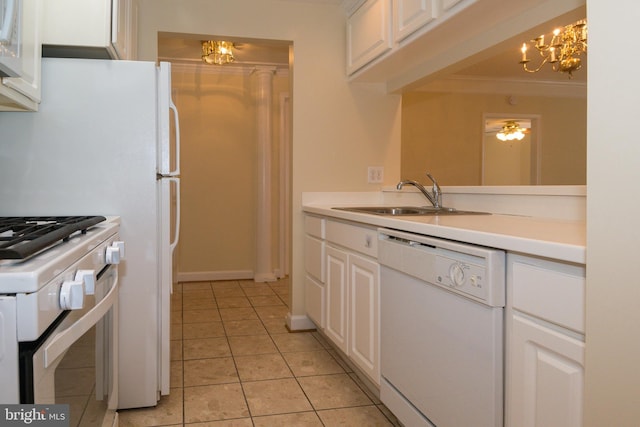 901 N Monroe St Unit 308, Arlington, VA 22201 - kitchen featuring white appliances, white cabinetry, a chandelier, light countertops, and ornamental molding