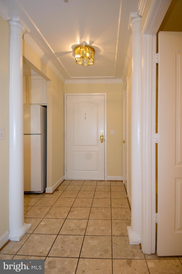 901 N Monroe St Unit 308, Arlington, VA 22201 - corridor featuring ornamental molding, decorative columns, and light tile patterned flooring