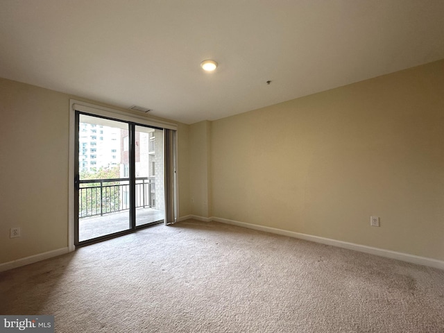 901 N Monroe St Unit 308, Arlington, VA 22201 - unfurnished room featuring light colored carpet and baseboards