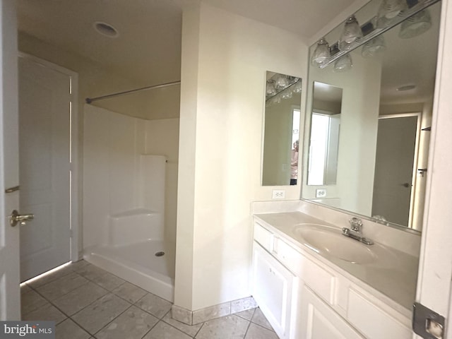 901 N Monroe St Unit 308, Arlington, VA 22201 - full bathroom with walk in shower, tile patterned floors, and vanity