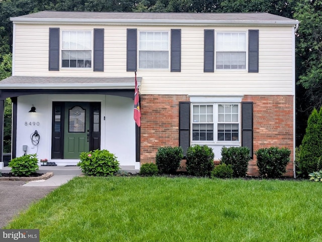 8490 Magic Tree Ct, Springfield, VA 22153 - view of front of home featuring brick siding and a front yard