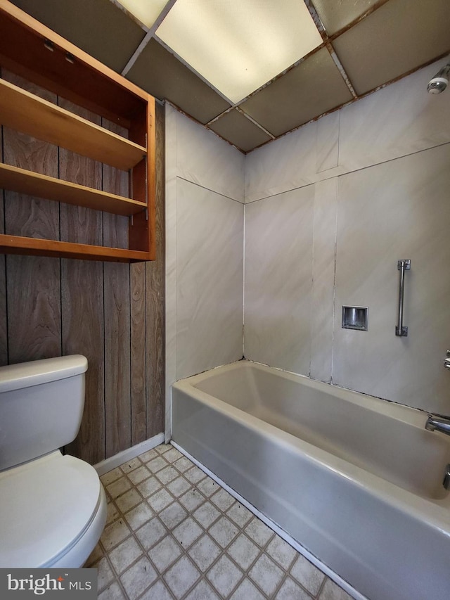 329 N 13th St, Reading, PA 19604 - full bathroom featuring tile patterned floors and a tub to relax in