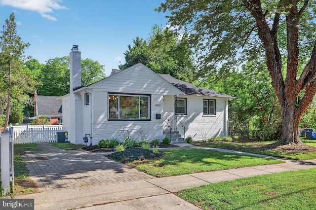3803 Kayson St, Silver Spring, MD 20906 - bungalow-style house featuring brick siding, a chimney, and entry steps