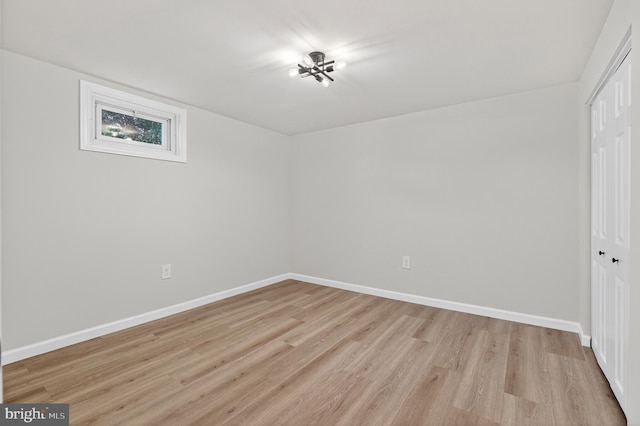 3803 Kayson St, Silver Spring, MD 20906 - unfurnished bedroom with a closet and light wood-style flooring