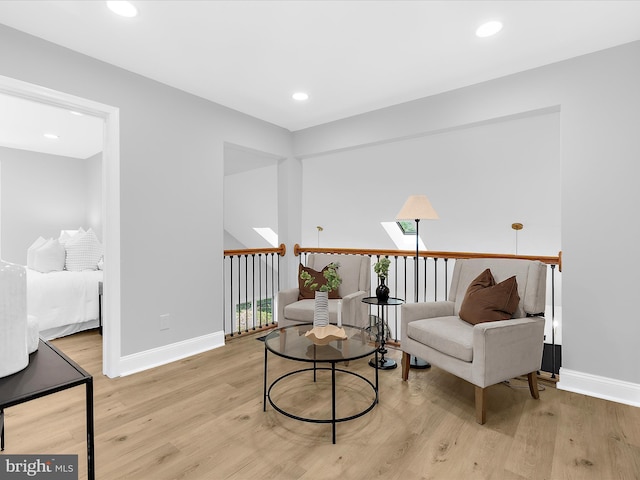 9300 Bellbeck Rd, Baltimore, MD 21234 - living area with light wood-style flooring and recessed lighting