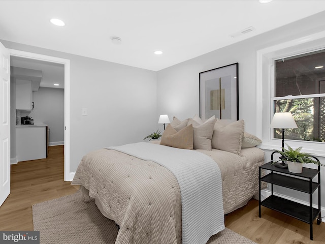 9300 Bellbeck Rd, Baltimore, MD 21234 - bedroom with light wood-style flooring and recessed lighting