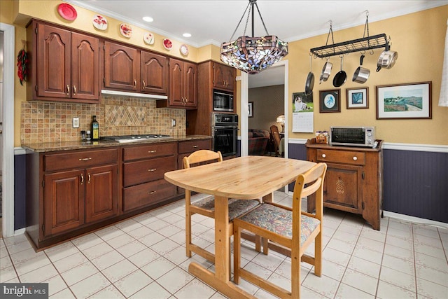9210 Cherrytree Dr, Alexandria, VA 22309 - kitchen with black appliances, backsplash, crown molding, light tile patterned floors, and decorative light fixtures