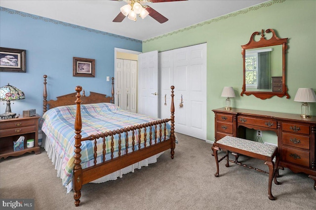 9210 Cherrytree Dr, Alexandria, VA 22309 - carpeted bedroom with a ceiling fan and two closets