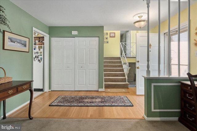 9210 Cherrytree Dr, Alexandria, VA 22309 - entryway with stairs and wood finished floors