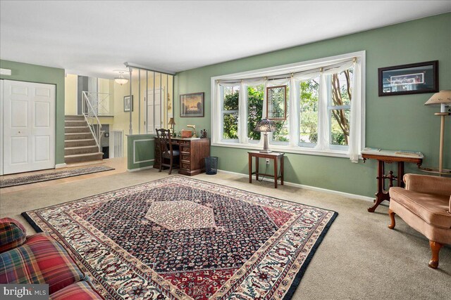 9210 Cherrytree Dr, Alexandria, VA 22309 - sitting room with carpet and stairs