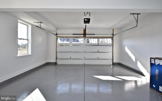 000 Lenape Dr, Lansdale, PA 19446 - garage featuring a garage door opener and baseboards