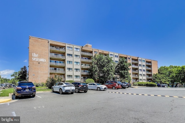 5851 Quantrell Ave Unit 407, Alexandria, VA 22312 - view of apartment building / complex with uncovered parking