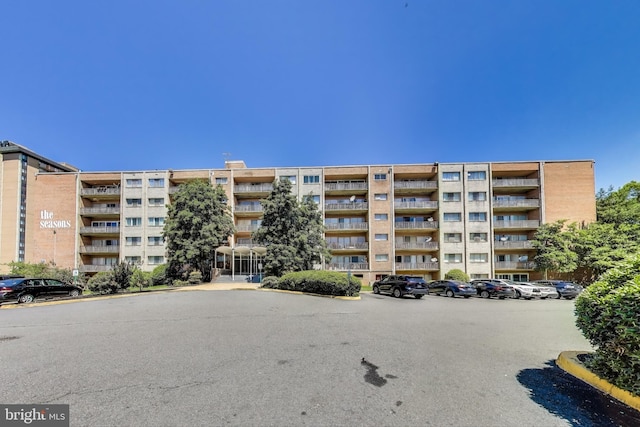 5851 Quantrell Ave Unit 407, Alexandria, VA 22312 - view of apartment building / complex with uncovered parking