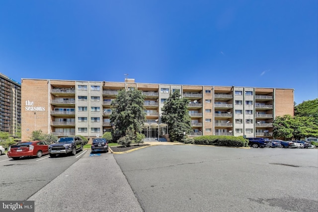 5851 Quantrell Ave Unit 407, Alexandria, VA 22312 - view of apartment building / complex with uncovered parking