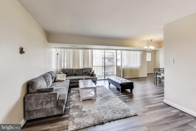 5851 Quantrell Ave Unit 407, Alexandria, VA 22312 - living area featuring a chandelier and wood finished floors
