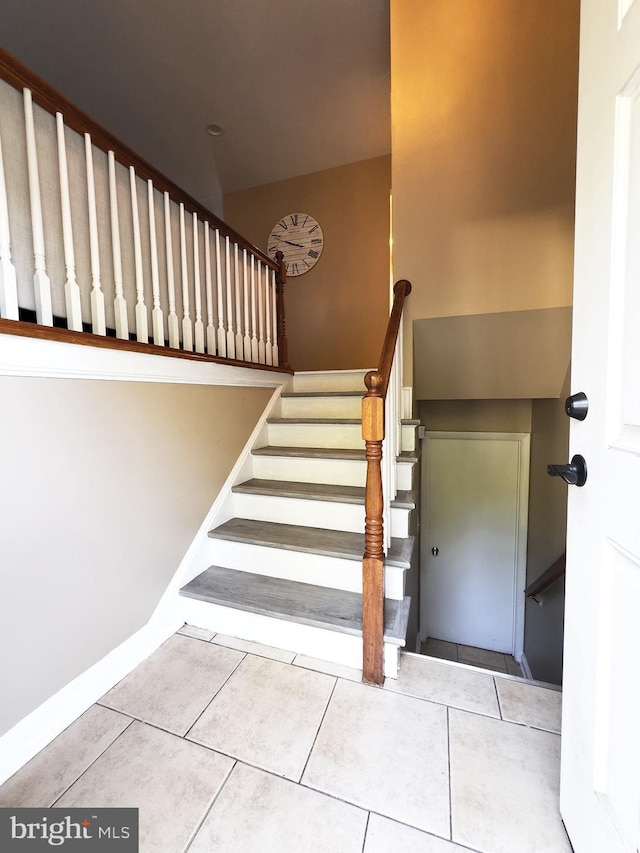 6802 Temple Hill Rd, Temple Hills, MD 20748 - stairway featuring tile patterned floors and baseboards