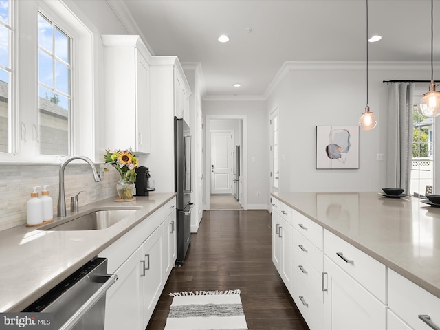 11412 Dairy St, Fulton, MD 20759 - kitchen with appliances with stainless steel finishes, white cabinetry, backsplash, light countertops, and recessed lighting